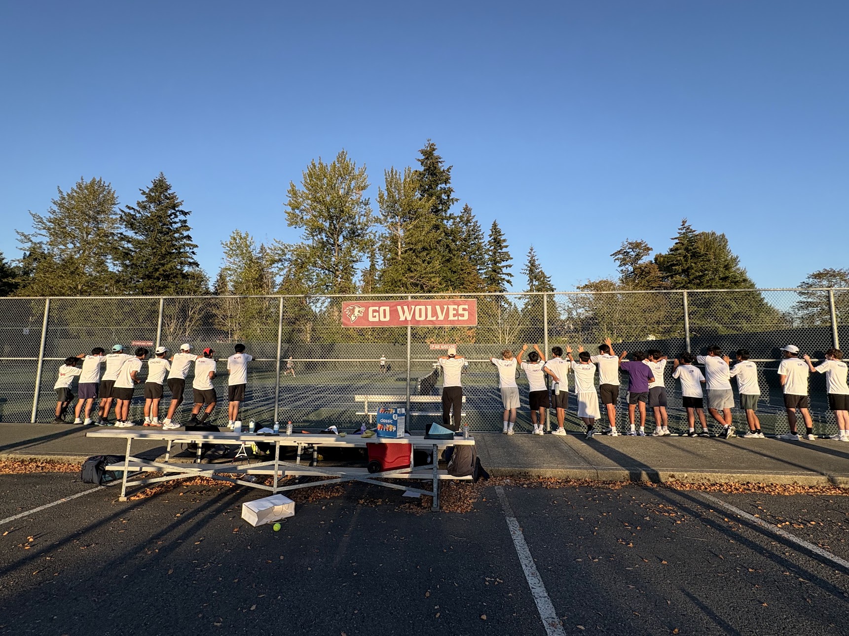 Eastlake Boys Tennis supporters cheering for the team